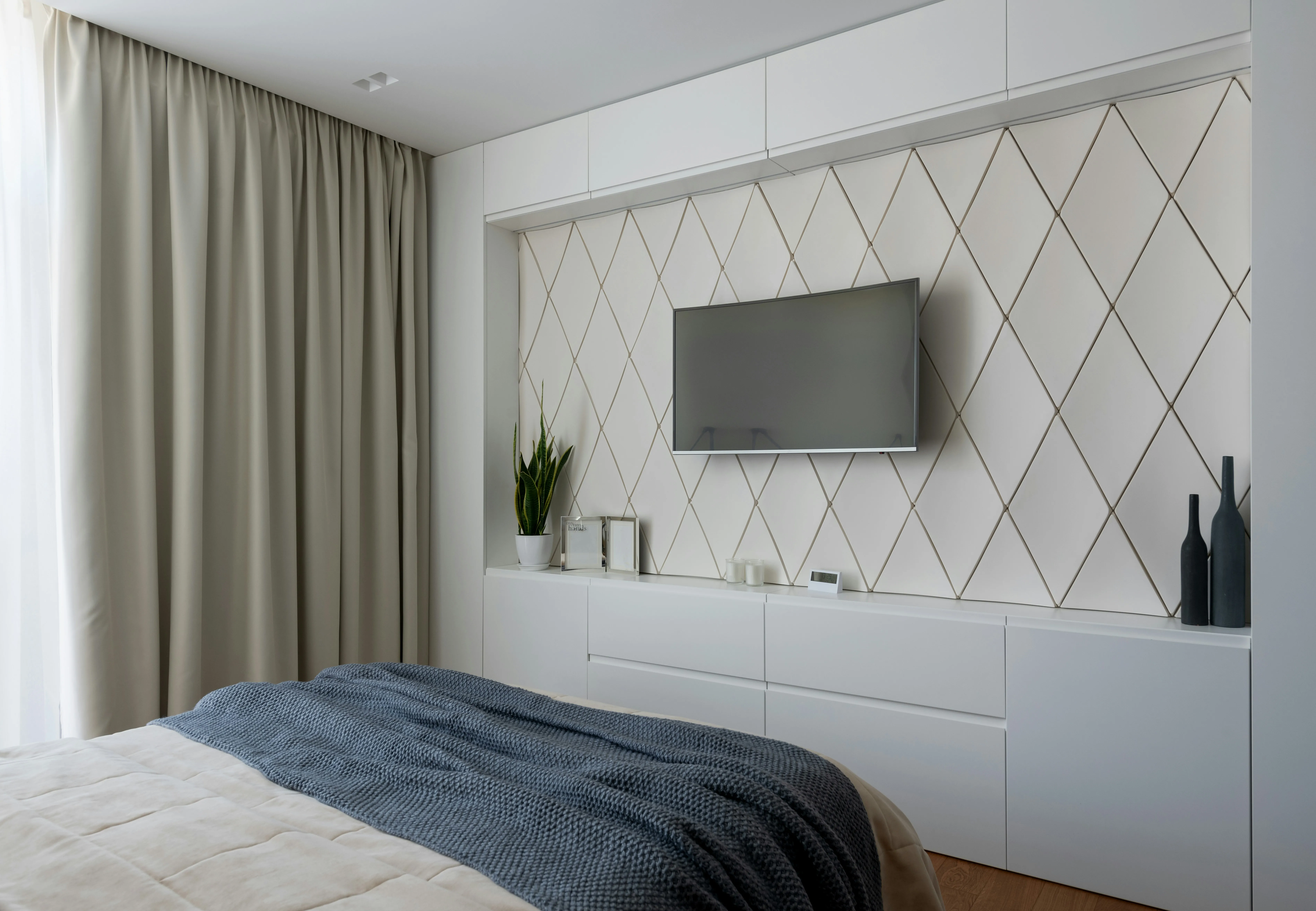 Modern TV mounted on wall